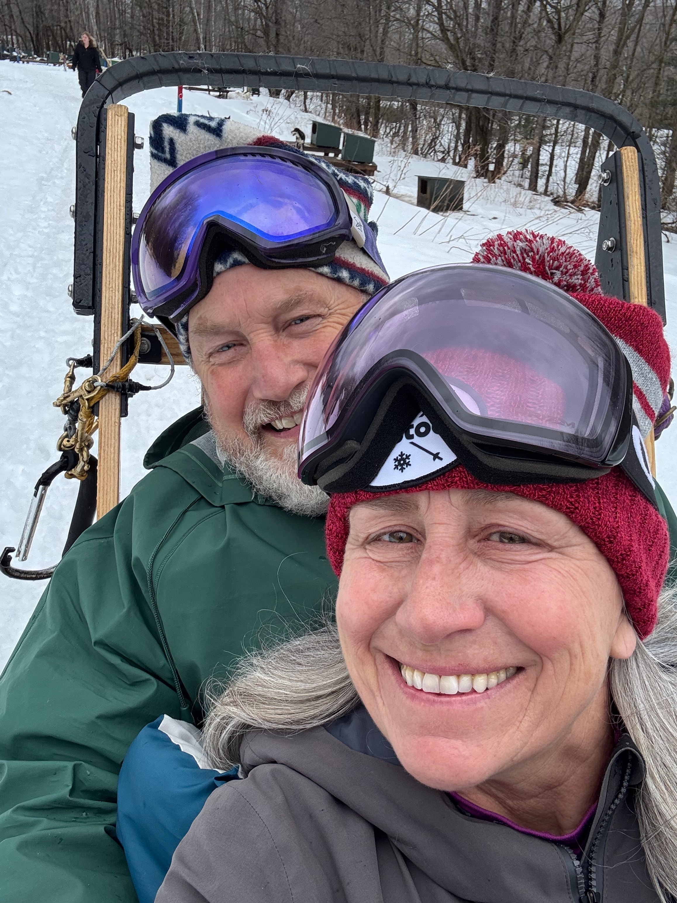 Laura Dunham outdoors in winter with a friend